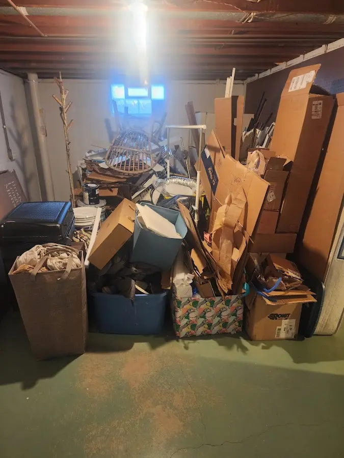 Roll-off dumpster container at job site for 2 Yard Dumpster Rental in Marietta